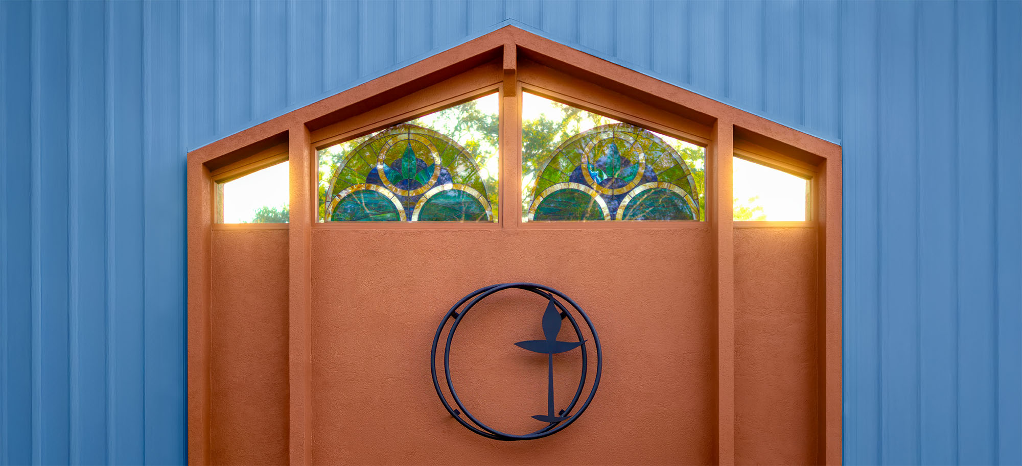 Tri-County Unitarian Universalists stained glass and chalice